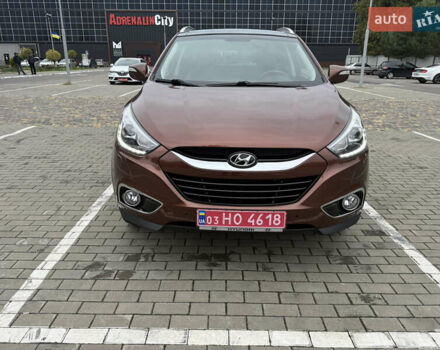 Коричневий Хендай іх35, об'ємом двигуна 2 л та пробігом 211 тис. км за 17400 $, фото 6 на Automoto.ua