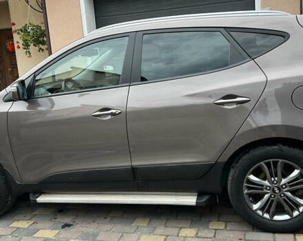 Коричневый Хендай их35, объемом двигателя 2 л и пробегом 223 тыс. км за 14500 $, фото 3 на Automoto.ua