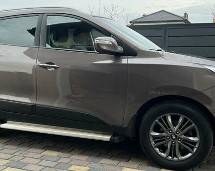 Коричневый Хендай их35, объемом двигателя 2 л и пробегом 223 тыс. км за 14500 $, фото 9 на Automoto.ua