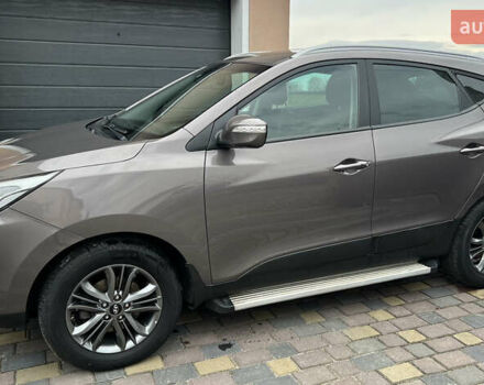 Коричневый Хендай их35, объемом двигателя 2 л и пробегом 223 тыс. км за 14500 $, фото 1 на Automoto.ua