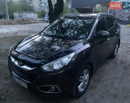 Коричневый Хендай их35, объемом двигателя 2 л и пробегом 240 тыс. км за 10000 $, фото 1 на Automoto.ua