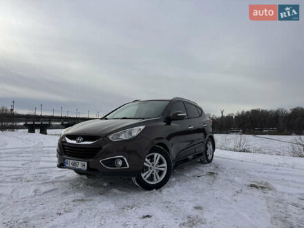 Коричневый Хендай их35, объемом двигателя 2 л и пробегом 198 тыс. км за 10700 $, фото 1 на Automoto.ua