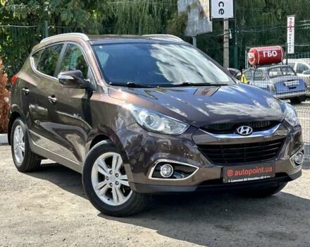 Коричневий Хендай іх35, об'ємом двигуна 1.7 л та пробігом 196 тис. км за 12900 $, фото 1 на Automoto.ua