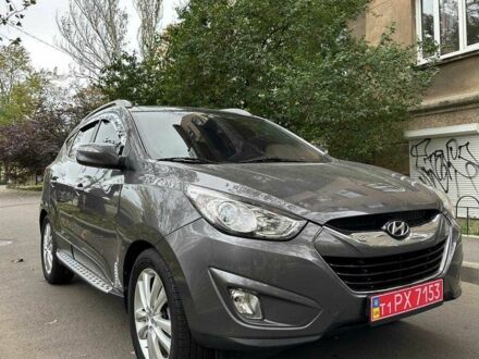 Коричневий Хендай іх35, об'ємом двигуна 2 л та пробігом 173 тис. км за 12250 $, фото 1 на Automoto.ua