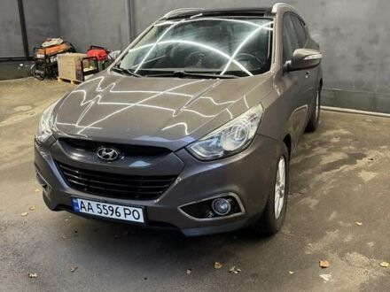 Коричневий Хендай іх35, об'ємом двигуна 2 л та пробігом 226 тис. км за 11500 $, фото 1 на Automoto.ua