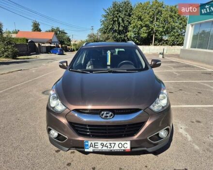 Коричневый Хендай их35, объемом двигателя 2 л и пробегом 115 тыс. км за 13000 $, фото 1 на Automoto.ua