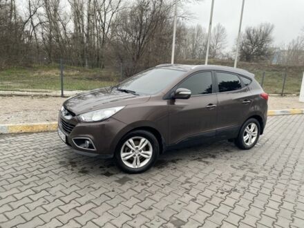 Коричневий Хендай іх35, об'ємом двигуна 2 л та пробігом 185 тис. км за 10615 $, фото 1 на Automoto.ua