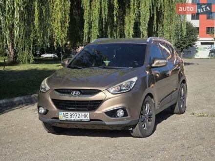 Коричневый Хендай их35, объемом двигателя 2 л и пробегом 95 тыс. км за 13000 $, фото 1 на Automoto.ua