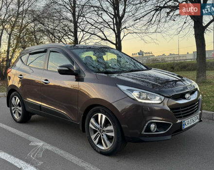 Коричневий Хендай іх35, об'ємом двигуна 2 л та пробігом 176 тис. км за 14500 $, фото 1 на Automoto.ua