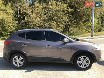 Коричневий Хендай іх35, об'ємом двигуна 2 л та пробігом 191 тис. км за 12500 $, фото 1 на Automoto.ua