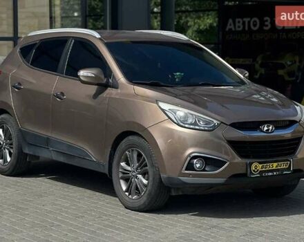 Коричневий Хендай іх35, об'ємом двигуна 2 л та пробігом 95 тис. км за 15500 $, фото 1 на Automoto.ua