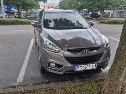 Коричневый Хендай их35, объемом двигателя 2 л и пробегом 218 тыс. км за 14000 $, фото 1 на Automoto.ua