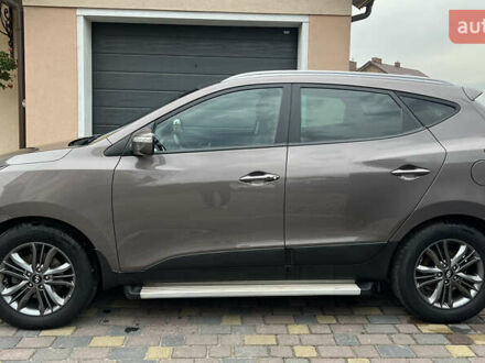 Коричневий Хендай іх35, об'ємом двигуна 2 л та пробігом 223 тис. км за 14500 $, фото 1 на Automoto.ua