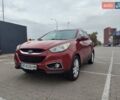 Красный Хендай их35, объемом двигателя 2 л и пробегом 238 тыс. км за 10800 $, фото 1 на Automoto.ua