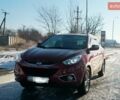 Красный Хендай их35, объемом двигателя 2 л и пробегом 100 тыс. км за 12000 $, фото 1 на Automoto.ua