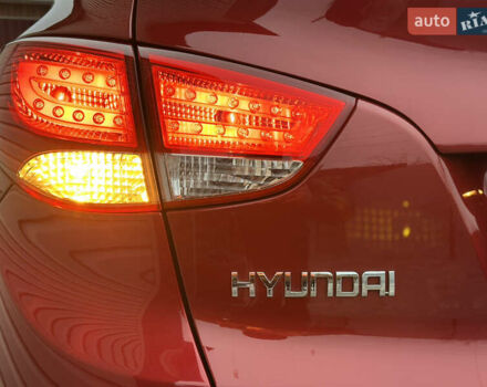 Червоний Хендай іх35, об'ємом двигуна 1.7 л та пробігом 240 тис. км за 10700 $, фото 7 на Automoto.ua