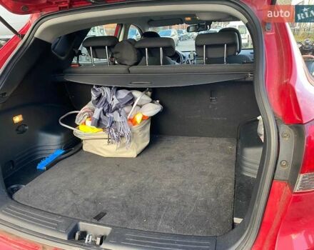 Червоний Хендай іх35, об'ємом двигуна 2 л та пробігом 107 тис. км за 14500 $, фото 4 на Automoto.ua