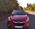 Красный Хендай их35, объемом двигателя 2 л и пробегом 212 тыс. км за 14700 $, фото 2 на Automoto.ua