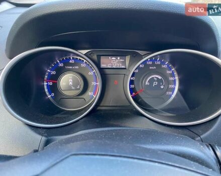 Червоний Хендай іх35, об'ємом двигуна 2 л та пробігом 107 тис. км за 14500 $, фото 6 на Automoto.ua