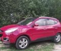 Красный Хендай их35, объемом двигателя 2 л и пробегом 214 тыс. км за 14000 $, фото 1 на Automoto.ua