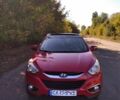 Красный Хендай их35, объемом двигателя 2 л и пробегом 214 тыс. км за 14000 $, фото 1 на Automoto.ua