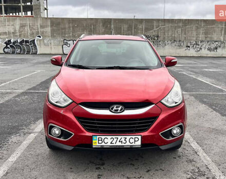 Червоний Хендай іх35, об'ємом двигуна 2 л та пробігом 213 тис. км за 12500 $, фото 1 на Automoto.ua