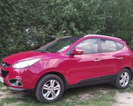 Червоний Хендай іх35, об'ємом двигуна 2 л та пробігом 214 тис. км за 14000 $, фото 1 на Automoto.ua