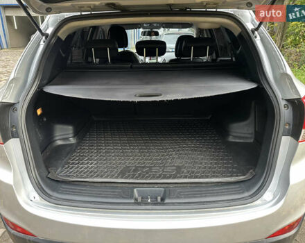 Сірий Хендай іх35, об'ємом двигуна 2 л та пробігом 215 тис. км за 11600 $, фото 6 на Automoto.ua