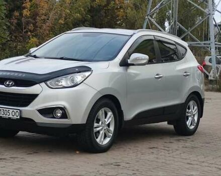 Серый Хендай их35, объемом двигателя 2 л и пробегом 151 тыс. км за 11450 $, фото 5 на Automoto.ua