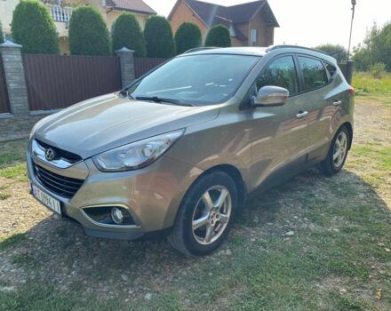 Сірий Хендай іх35, об'ємом двигуна 2 л та пробігом 244 тис. км за 10300 $, фото 1 на Automoto.ua