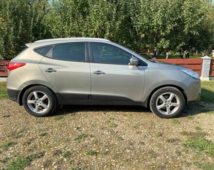 Сірий Хендай іх35, об'ємом двигуна 2 л та пробігом 244 тис. км за 10300 $, фото 7 на Automoto.ua