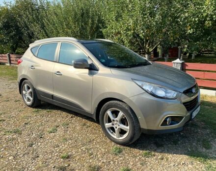 Сірий Хендай іх35, об'ємом двигуна 2 л та пробігом 244 тис. км за 10300 $, фото 6 на Automoto.ua