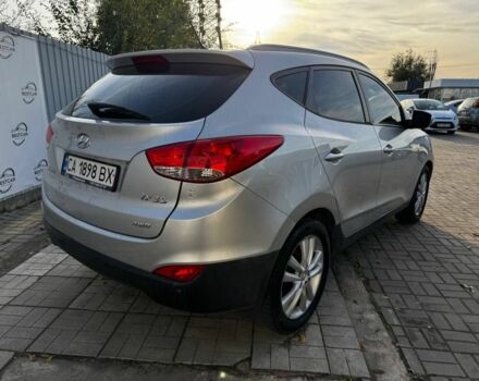 Сірий Хендай іх35, об'ємом двигуна 2 л та пробігом 228 тис. км за 10999 $, фото 2 на Automoto.ua