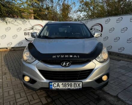 Сірий Хендай іх35, об'ємом двигуна 2 л та пробігом 228 тис. км за 10999 $, фото 4 на Automoto.ua