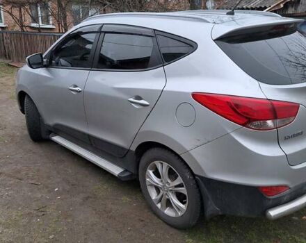 Сірий Хендай іх35, об'ємом двигуна 2 л та пробігом 99 тис. км за 11500 $, фото 26 на Automoto.ua
