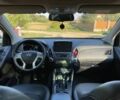 Сірий Хендай іх35, об'ємом двигуна 2 л та пробігом 244 тис. км за 10300 $, фото 12 на Automoto.ua