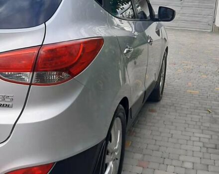 Сірий Хендай іх35, об'ємом двигуна 2 л та пробігом 178 тис. км за 13200 $, фото 3 на Automoto.ua