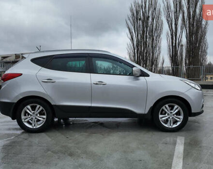 Серый Хендай их35, объемом двигателя 2 л и пробегом 174 тыс. км за 13990 $, фото 6 на Automoto.ua