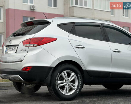 Сірий Хендай іх35, об'ємом двигуна 2 л та пробігом 132 тис. км за 11999 $, фото 8 на Automoto.ua