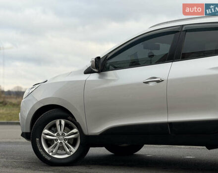 Сірий Хендай іх35, об'ємом двигуна 2 л та пробігом 132 тис. км за 11999 $, фото 12 на Automoto.ua