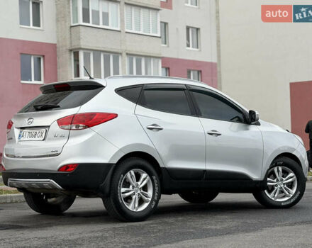 Сірий Хендай іх35, об'ємом двигуна 2 л та пробігом 132 тис. км за 11999 $, фото 7 на Automoto.ua