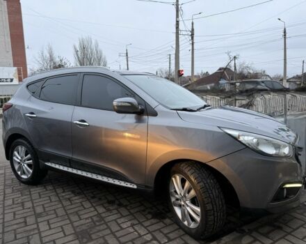 Сірий Хендай іх35, об'ємом двигуна 2 л та пробігом 186 тис. км за 11900 $, фото 23 на Automoto.ua