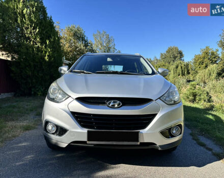 Сірий Хендай іх35, об'ємом двигуна 2 л та пробігом 194 тис. км за 11490 $, фото 1 на Automoto.ua