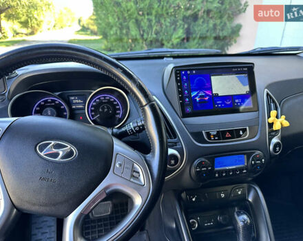 Сірий Хендай іх35, об'ємом двигуна 2 л та пробігом 194 тис. км за 11490 $, фото 6 на Automoto.ua
