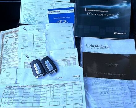 Сірий Хендай іх35, об'ємом двигуна 2.4 л та пробігом 220 тис. км за 11950 $, фото 8 на Automoto.ua