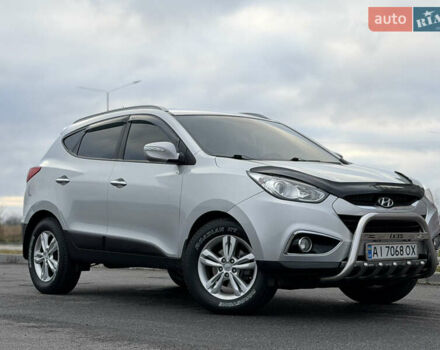 Сірий Хендай іх35, об'ємом двигуна 2 л та пробігом 132 тис. км за 11999 $, фото 5 на Automoto.ua
