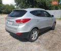 Сірий Хендай іх35, об'ємом двигуна 2 л та пробігом 442 тис. км за 9250 $, фото 6 на Automoto.ua