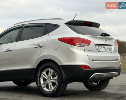 Сірий Хендай іх35, об'ємом двигуна 2 л та пробігом 132 тис. км за 11999 $, фото 14 на Automoto.ua