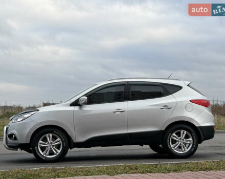 Сірий Хендай іх35, об'ємом двигуна 2 л та пробігом 132 тис. км за 11999 $, фото 17 на Automoto.ua