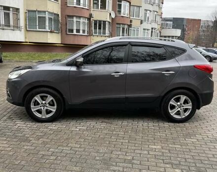 Сірий Хендай іх35, об'ємом двигуна 2.36 л та пробігом 220 тис. км за 11750 $, фото 4 на Automoto.ua